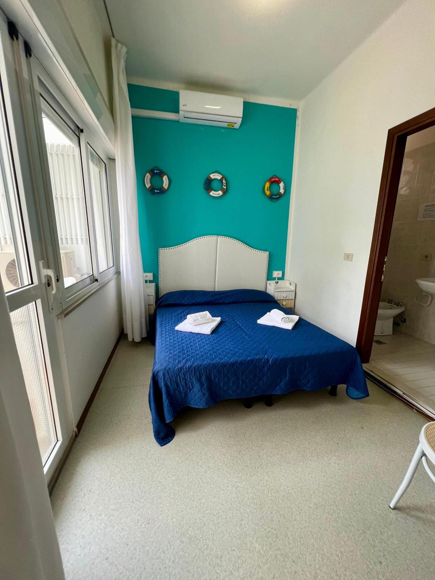Hotel Amalfi&Dépendance Lignano Sabbiadoro Esterno foto